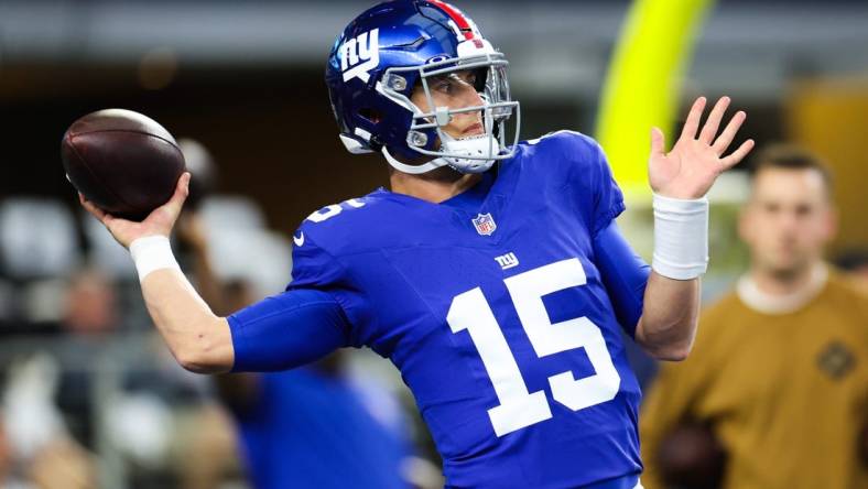 Nov 12, 2023; Arlington, Texas, USA;  New York Giants quarterback Tommy DeVito (15) warms up before the game against the Dallas Cowboys at AT&T Stadium. Mandatory Credit: Kevin Jairaj-USA TODAY Sports