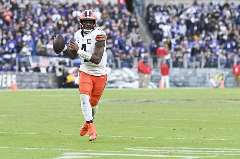Nov 12, 2023; Baltimore, Maryland, USA;  Cleveland Browns quarterback Deshaun Watson (4) throws on the run during the second halfagainst the Baltimore Ravens at M&T Bank Stadium. Mandatory Credit: Tommy Gilligan-USA TODAY Sports