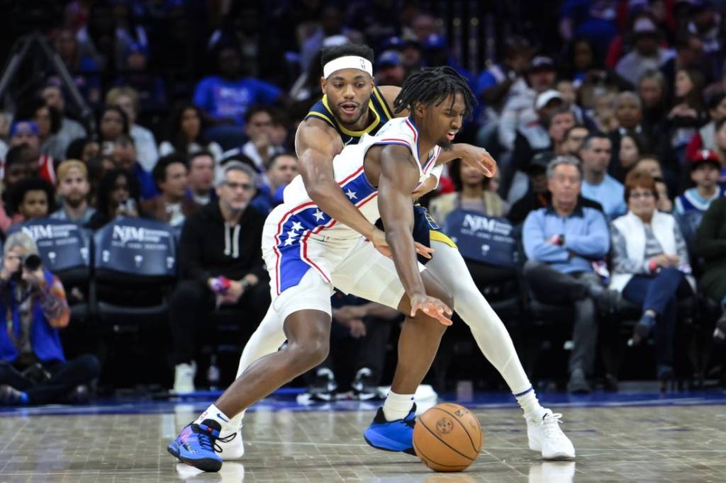 Nov 12, 2023; Philadelphia, Pennsylvania, USA; Indiana Pacers forward Bruce Brown (11) tries to steal the ball away from Philadelphia 76ers guard Tyrese Maxey (0) during the first quarter at Wells Fargo Center. Mandatory Credit:  John Jones-USA TODAY Sports