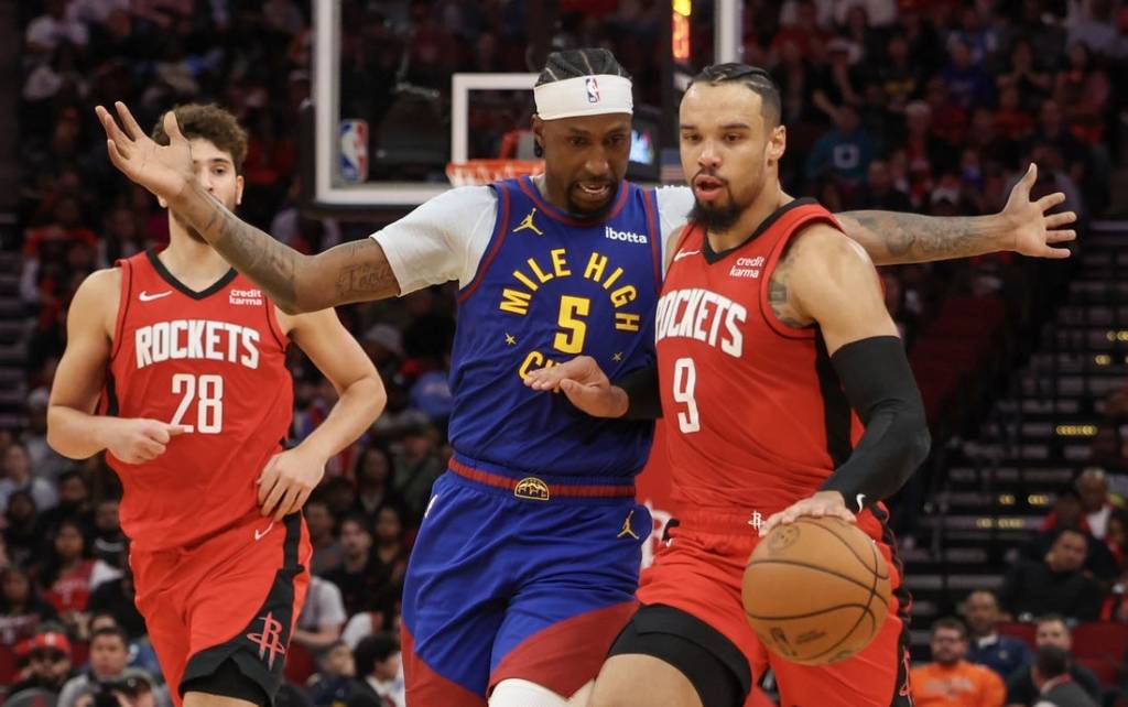 Nov 12, 2023; Houston, Texas, USA; Houston Rockets forward Dillon Brooks (9) dribbles against Denver Nuggets guard Kentavious Caldwell-Pope (5) in the second quarter at Toyota Center. Mandatory Credit: Thomas Shea-USA TODAY Sports