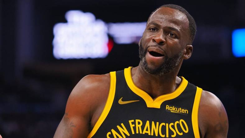 Nov 12, 2023; San Francisco, California, USA; Golden State Warriors forward Draymond Green (23) reacts after a call against the Minnesota Timberwolves during the second quarter at Chase Center. Mandatory Credit: Kelley L Cox-USA TODAY Sports