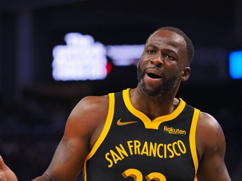 Nov 12, 2023; San Francisco, California, USA; Golden State Warriors forward Draymond Green (23) reacts after a call against the Minnesota Timberwolves during the second quarter at Chase Center. Mandatory Credit: Kelley L Cox-USA TODAY Sports