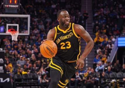 Nov 12, 2023; San Francisco, California, USA; Golden State Warriors forward Draymond Green (23) controls the ball against the Minnesota Timberwolves during the third quarter at Chase Center. Mandatory Credit: Kelley L Cox-USA TODAY Sports