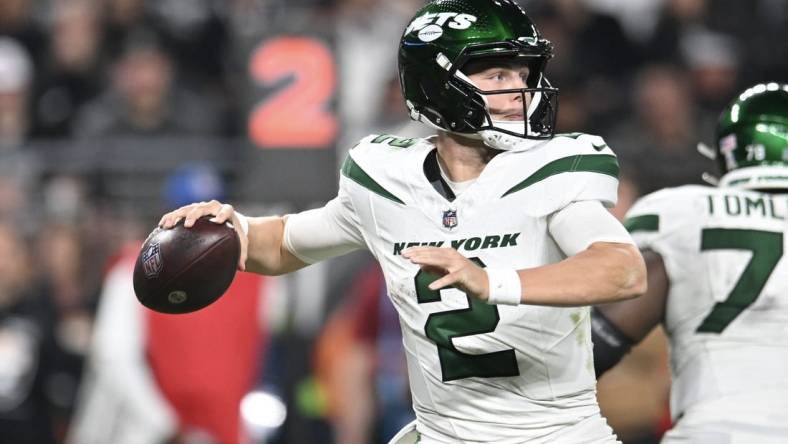 Nov 12, 2023; Paradise, Nevada, USA; New York Jets quarterback Zach Wilson (2) looks to make a pass against the Las Vegas Raiders in the second quarter at Allegiant Stadium. Mandatory Credit: Candice Ward-USA TODAY Sports