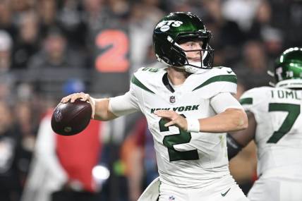Nov 12, 2023; Paradise, Nevada, USA; New York Jets quarterback Zach Wilson (2) looks to make a pass against the Las Vegas Raiders in the second quarter at Allegiant Stadium. Mandatory Credit: Candice Ward-USA TODAY Sports