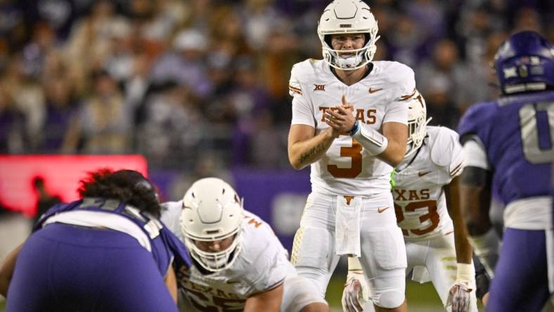 Nov 11, 2023; Fort Worth, Texas, USA; Texas Longhorns quarterback Quinn Ewers (3) in action during the game between the TCU Horned Frogs and the Texas Longhorns at Amon G. Carter Stadium. Mandatory Credit: Jerome Miron-USA TODAY Sports