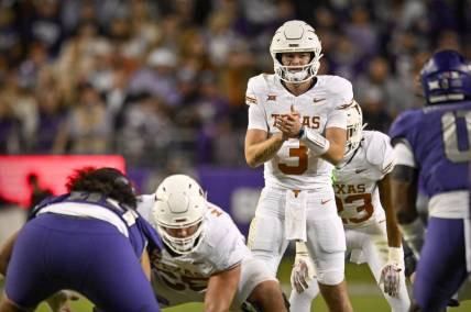 Nov 11, 2023; Fort Worth, Texas, USA; Texas Longhorns quarterback Quinn Ewers (3) in action during the game between the TCU Horned Frogs and the Texas Longhorns at Amon G. Carter Stadium. Mandatory Credit: Jerome Miron-USA TODAY Sports
