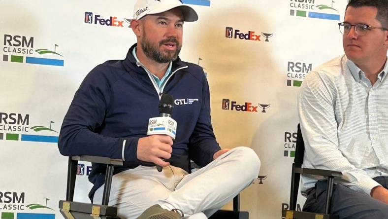 British Open champion Brian Harman (left) ponders a question during a news conference on Tuesday at the Sea Island Club on St. Simons Island, Ga., the site of this week's RSM Classic.