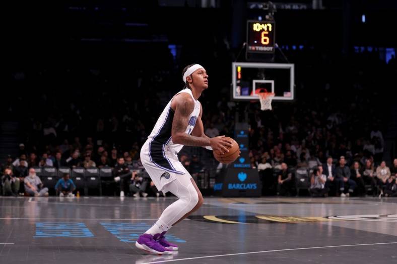 Nov 14, 2023; Brooklyn, New York, USA; Orlando Magic forward Paolo Banchero (5) looks to shoot the ball against the Brooklyn Nets during the first quarter at Barclays Center. Mandatory Credit: Brad Penner-USA TODAY Sports