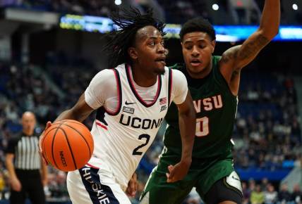 Nov 14, 2023; Hartford, Connecticut, USA; UConn Huskies guard Tristen Newton (2) drives the ball against Mississippi Valley State Delta Devils guard Rayquan Brown (0) in the first half at XL Center. Mandatory Credit: David Butler II-USA TODAY Sports