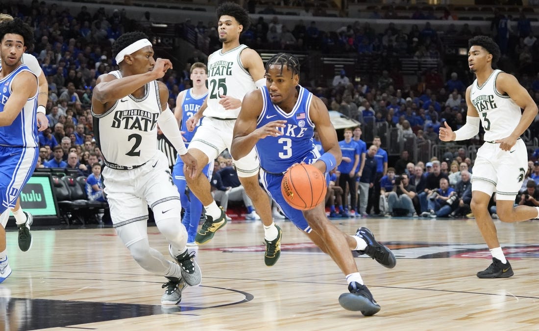 Nov 14, 2023; Chicago, Illinois, USA; Michigan State Spartans guard Tyson Walker (2) defends Duke Blue Devils guard Jeremy Roach (3) during the first half at United Center. Mandatory Credit: David Banks-USA TODAY Sports