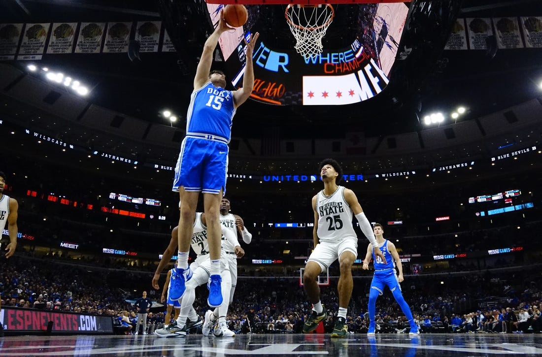 Duke Blue Devils center Ryan Young (15) scores against the Michigan State Spartans during the first half at United Center. Mandatory Credit: David Banks-USA TODAY Sports