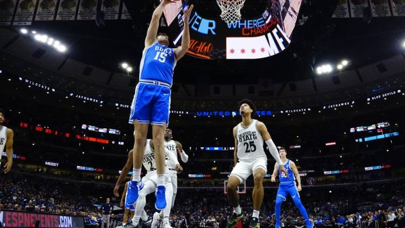 Duke Blue Devils center Ryan Young (15) scores against the Michigan State Spartans during the first half at United Center. Mandatory Credit: David Banks-USA TODAY Sports