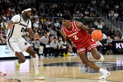Nov 14, 2023; Providence, Rhode Island, USA; Wisconsin Badgers guard AJ Storr (2) drives the ball up the court during the second half against the Providence Friars at Amica Mutual Pavilion. Mandatory Credit: Eric Canha-USA TODAY Sports