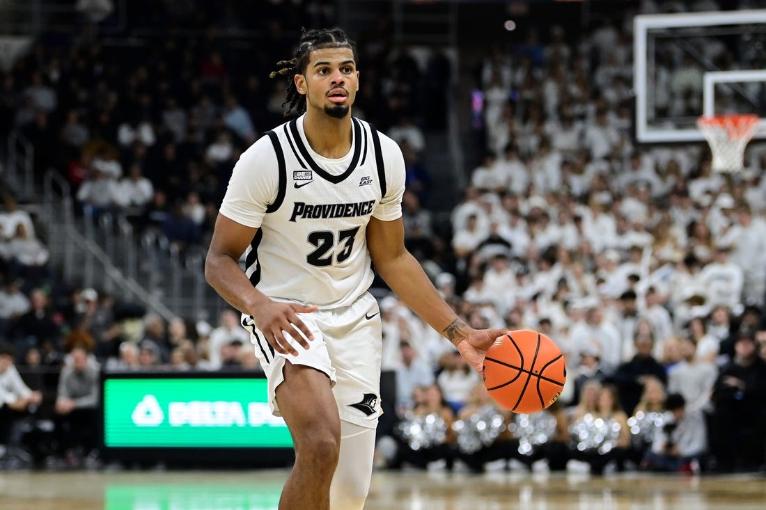 Nov 14, 2023; Providence, Rhode Island, USA; Providence Friars forward Bryce Hopkins (23) passes the ball during the first half Wisconsin Badgers at Amica Mutual Pavilion. Mandatory Credit: Eric Canha-USA TODAY Sports