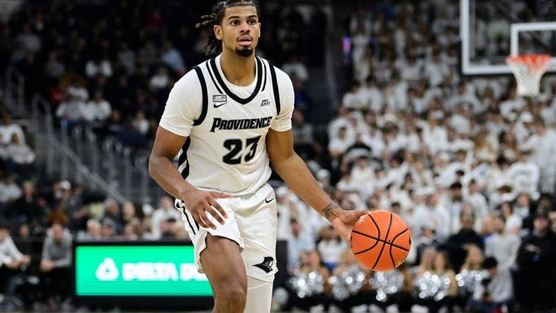 Nov 14, 2023; Providence, Rhode Island, USA; Providence Friars forward Bryce Hopkins (23) passes the ball during the first half Wisconsin Badgers at Amica Mutual Pavilion. Mandatory Credit: Eric Canha-USA TODAY Sports