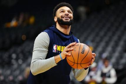 Nov 14, 2023; Denver, Colorado, USA; Denver Nuggets guard Jamal Murray (27) warms up before the game against the LA Clippers at Ball Arena. Mandatory Credit: Ron Chenoy-USA TODAY Sports
