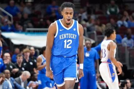 Nov 14, 2023; Chicago, Illinois, USA; Kentucky Wildcats guard Antonio Reeves (12) reacts after scoring against the Kansas Jayhawks during the second half at United Center. Mandatory Credit: David Banks-USA TODAY Sports