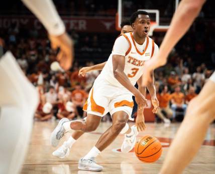 Texas guard Max Abmas (3) brings the ball down the court in the second half of Longhorns' game against the Rice Owls at the Moody Center in Austin, Wednesday, Nov. 15, 2023. Texas won the game 80-64.