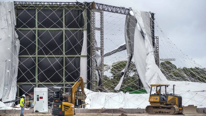 Nov 16, 2023; PALM BEACH GARDENS, FL, USA;  The air-supported dome for the future home of the TGL indoor golf league founded by Tiger Woods and Rory McIlroy  was damaged and deflated Tuesday night after a temporary power system outage at the site. There were no injuries, and no technology was damaged in Palm Beach Gardens, Florida.at . Mandatory Credit: Greg Lovett-USA TODAY