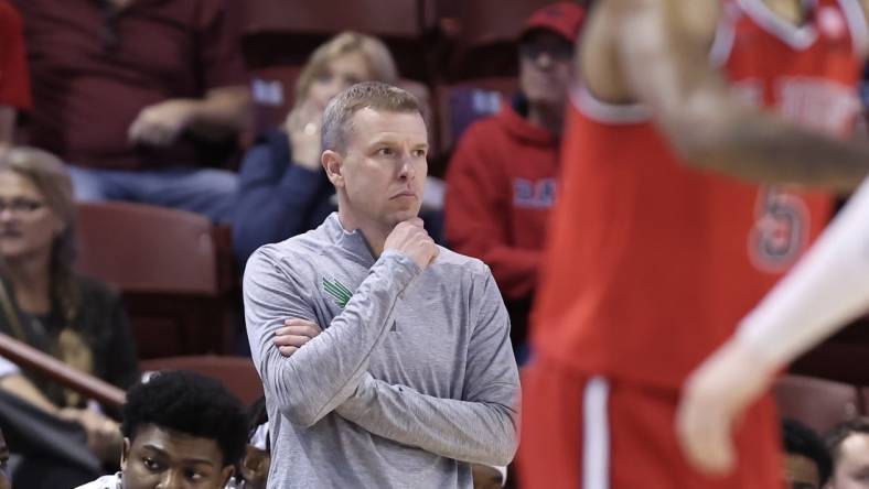 Nov 16, 2023; Charleston, South Carolina, USA; North Texas Mean Green head coach Ross Hodge on the side line in the second half against the St. John's Red Storm at TD Arena. Mandatory Credit: David Yeazell-USA TODAY Sports