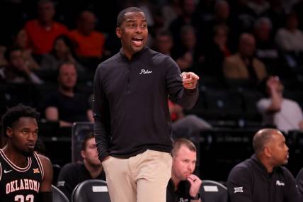 Nov 16, 2023; Brooklyn, New York, USA; Oklahoma State Cowboys head coach Mike Boynton coaches against the St. Bonaventure Bonnies during the first half at Barclays Center. Mandatory Credit: Brad Penner-USA TODAY Sports