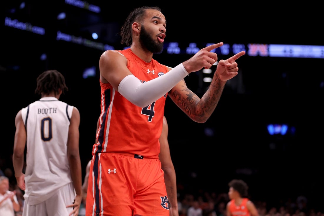 Nov 16, 2023; Brooklyn, New York, USA; Auburn Tigers forward Johni Broome (4) reacts during the second half against the Notre Dame Fighting Irish at Barclays Center. Mandatory Credit: Brad Penner-USA TODAY Sports