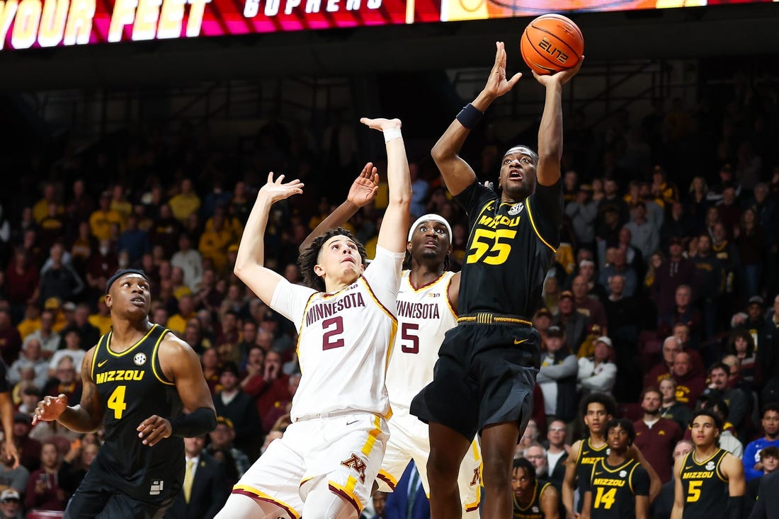 Nov 16, 2023; Minneapolis, Minnesota, USA; Missouri Tigers guard Sean East II (55) shoots against the Minnesota Golden Gophers during the second half at Williams Arena. Mandatory Credit: Matt Krohn-USA TODAY Sports