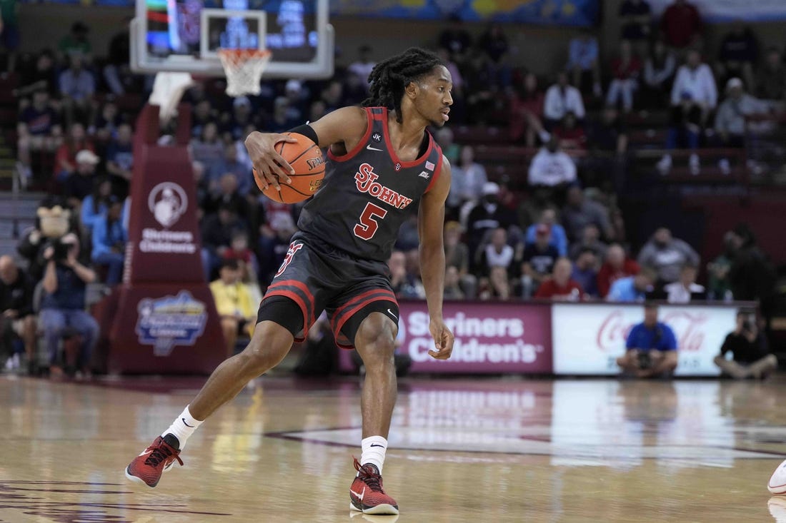 Nov 17, 2023; Charleston, SC, USA; St. John's Red Storm guard Daniss Jenkins (5) drives the ball in the first half against the Dayton Flyers at TD Arena. Mandatory Credit: David Yeazell-USA TODAY Sports