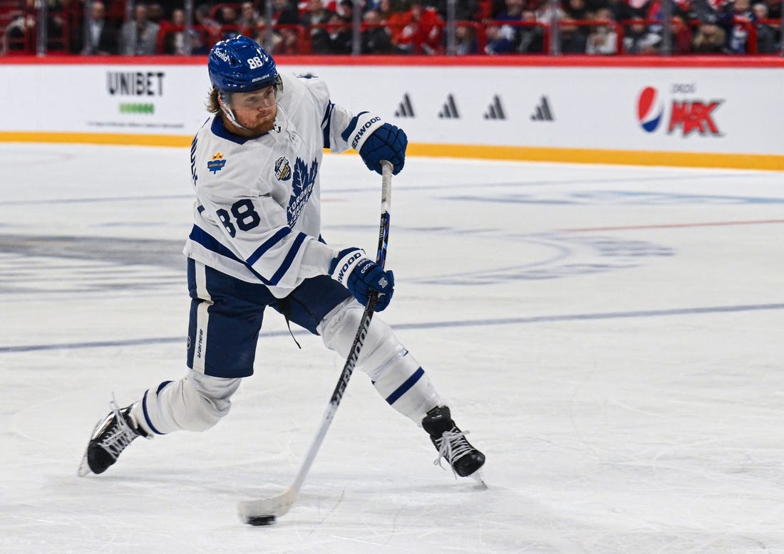 Nov 17, 2023; Stockholm, SWE; Toronto Maple Leafs right wing William Nylander (88) takes a shot against the Detroit Red Wings during a Global Series NHL hockey game at Avicii Arena. Mandatory Credit: Per Haljestam-USA TODAY Sports