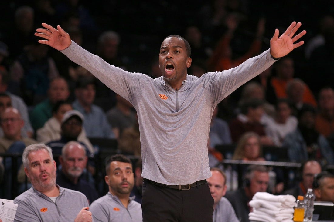 Nov 17, 2023; Brookyln, NY, USA; Oklahoma State Cowboys head coach Mike Boynton coaches against the Notre Dame Fighting Irish during the second half at Barclays Center. Mandatory Credit: Brad Penner-USA TODAY Sports