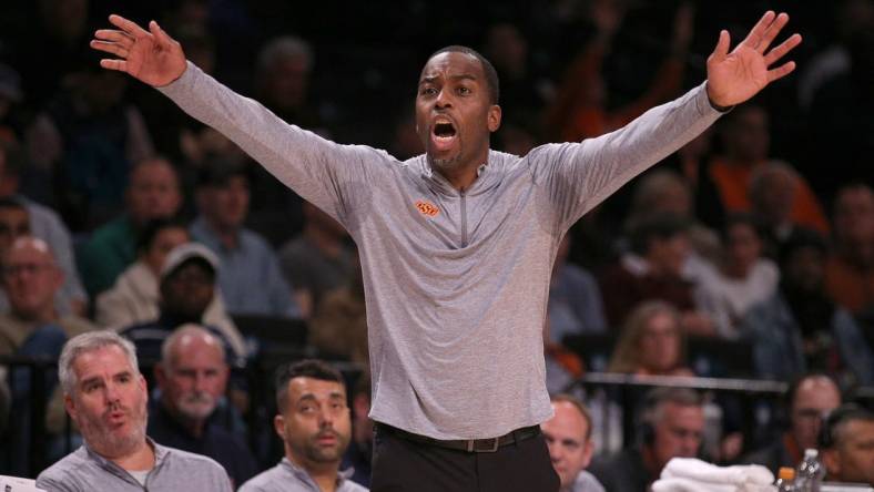 Nov 17, 2023; Brookyln, NY, USA; Oklahoma State Cowboys head coach Mike Boynton coaches against the Notre Dame Fighting Irish during the second half at Barclays Center. Mandatory Credit: Brad Penner-USA TODAY Sports