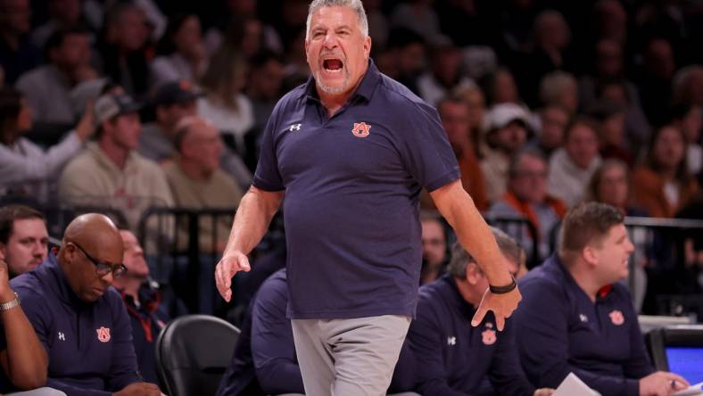 Nov 17, 2023; Brookyln, NY, USA; Auburn Tigers head coach Bruce Pearl coaches against the St. Bonaventure Bonnies during the first half at Barclays Center. Mandatory Credit: Brad Penner-USA TODAY Sports