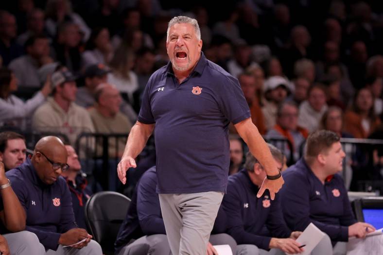 Nov 17, 2023; Brookyln, NY, USA; Auburn Tigers head coach Bruce Pearl coaches against the St. Bonaventure Bonnies during the first half at Barclays Center. Mandatory Credit: Brad Penner-USA TODAY Sports