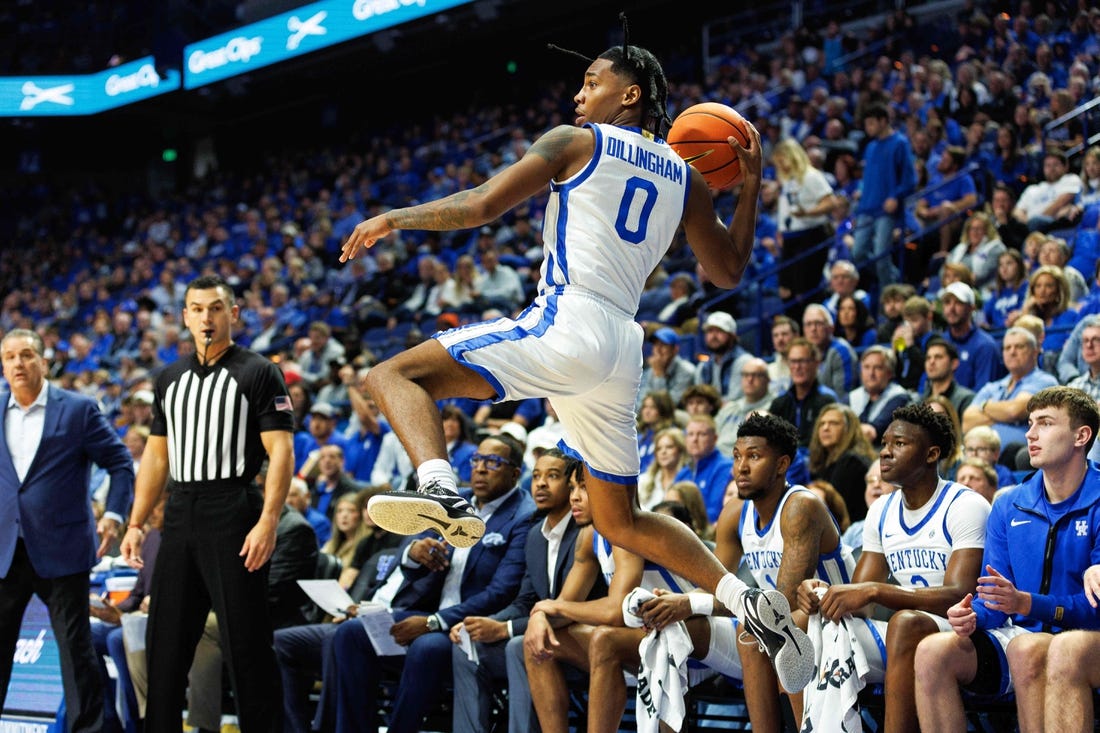 Nov 17, 2023; Lexington, Kentucky, USA; Kentucky Wildcats guard Rob Dillingham (0) saves a ball from going out of bounds during the first half against the Stonehill Skyhawks at Rupp Arena at Central Bank Center. Mandatory Credit: Jordan Prather-USA TODAY Sports