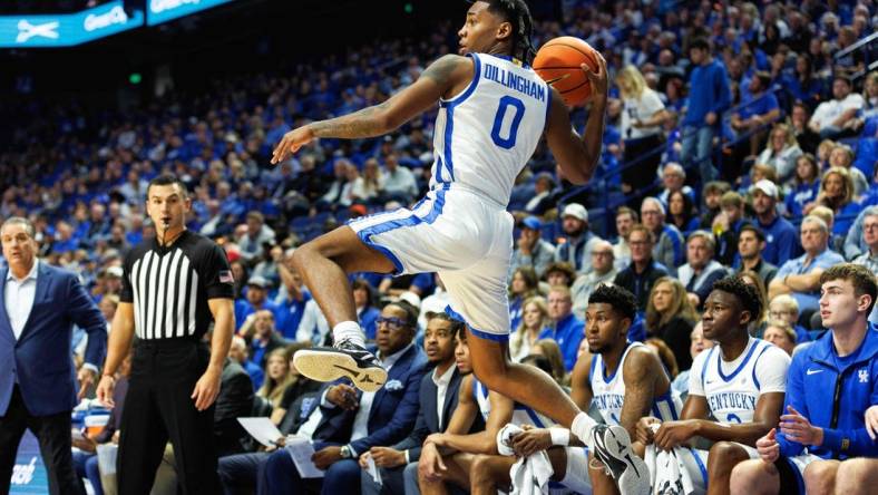 Nov 17, 2023; Lexington, Kentucky, USA; Kentucky Wildcats guard Rob Dillingham (0) saves a ball from going out of bounds during the first half against the Stonehill Skyhawks at Rupp Arena at Central Bank Center. Mandatory Credit: Jordan Prather-USA TODAY Sports