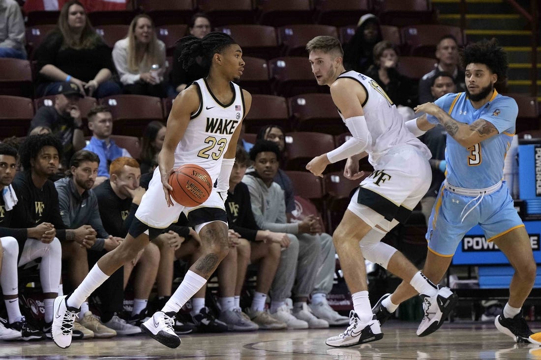 Nov 17, 2023; Charleston, SC, USA; Wake Forest Demon Deacons guard Hunter Sallis (23) drives with the ball in the second half against the Towson Tigers at TD Arena. Mandatory Credit: David Yeazell-USA TODAY Sports