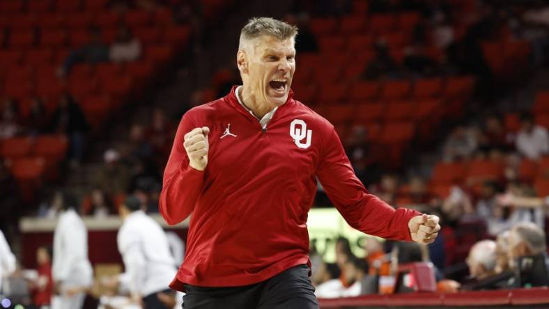 Nov 17, 2023; Norman, Oklahoma, USA; Oklahoma Sooners head coach Porter Moser reacts after his team scores against UT Rio Grande Valley Vaqueros during the second half at Lloyd Noble Center. Mandatory Credit: Alonzo Adams-USA TODAY Sports