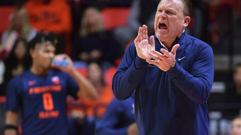 Nov 17, 2023; Champaign, Illinois, USA; Illinois Fighting Illini head coach Brad Underwood reacts off the bench during the second half against the Valparaiso Beacons at State Farm Center. Mandatory Credit: Ron Johnson-USA TODAY Sports