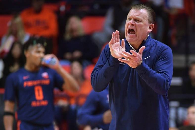 Nov 17, 2023; Champaign, Illinois, USA; Illinois Fighting Illini head coach Brad Underwood reacts off the bench during the second half against the Valparaiso Beacons at State Farm Center. Mandatory Credit: Ron Johnson-USA TODAY Sports