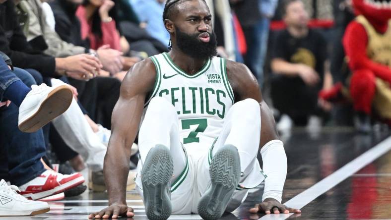 Nov 17, 2023; Toronto, Ontario, CAN; Boston Celtics guard Jaylen Brown (7) reacts after falling during play against the Toronto Raptors in the second  half at Scotiabank Arena. Mandatory Credit: Dan Hamilton-USA TODAY Sports