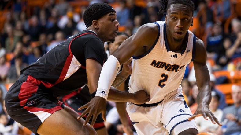 UTEP's Tae Hardy (2) dribbles the ball at a men's basketball game against Austin Peay on Friday, Nov. 17, 2023, at the Don Haskins Center in El Paso, Texas.