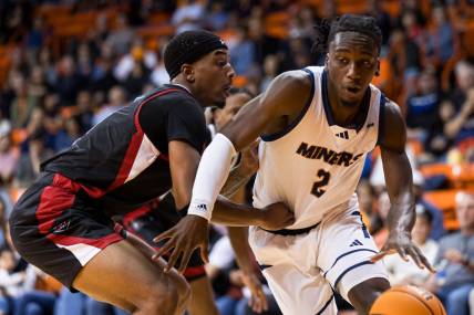 UTEP's Tae Hardy (2) dribbles the ball at a men's basketball game against Austin Peay on Friday, Nov. 17, 2023, at the Don Haskins Center in El Paso, Texas.