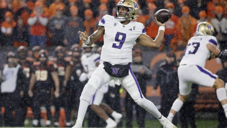 Nov 18, 2023; Corvallis, Oregon, USA; Washington Huskies quarterback Michael Penix Jr. (9) throws the ball during the first half against the Oregon State Beavers at Reser Stadium. Mandatory Credit: Soobum Im-USA TODAY Sports