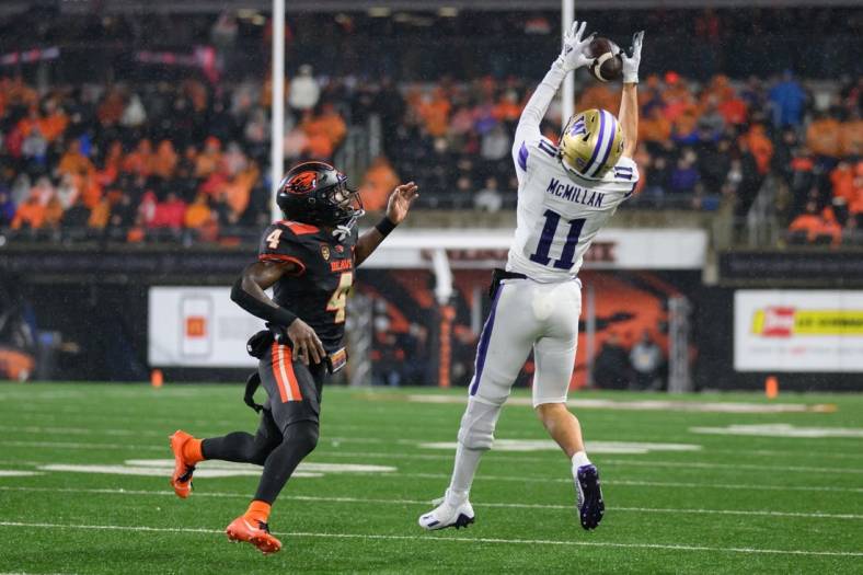 Nov 18, 2023; Corvallis, Oregon, USA; Washington Huskies wide receiver Jalen McMillan (11) goes up for a pass during the second half against the Oregon State Beavers at Reser Stadium. Mandatory Credit: Craig Strobeck-USA TODAY Sports