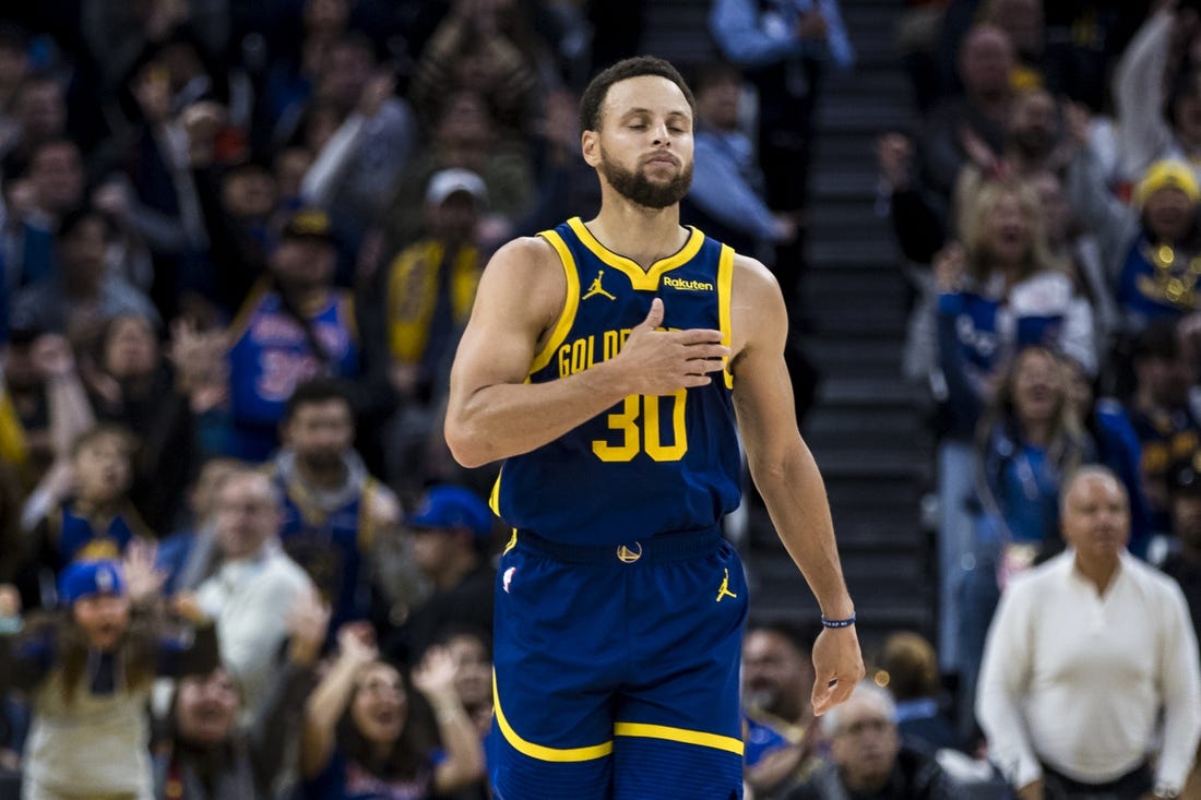 Nov 18, 2023; San Francisco, California, USA; Golden State Warriors guard Stephen Curry (30) reacts after scoring against the Oklahoma City Thunder during the second half at Chase Center. Mandatory Credit: John Hefti-USA TODAY Sports