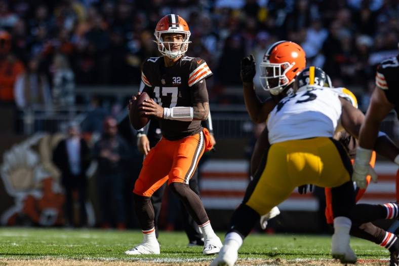 Nov 19, 2023; Cleveland, Ohio, USA; Cleveland Browns quarterback Dorian Thompson-Robinson (17) looks for an available receiver against the Pittsburgh Steelers during the first quarter at Cleveland Browns Stadium. Mandatory Credit: Scott Galvin-USA TODAY Sports