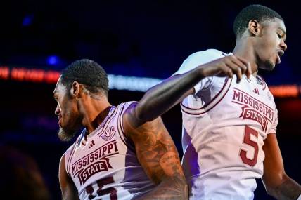 Nov 19, 2023; Uncasville, CT, USA; Mississippi State Bulldogs forward Jimmy Bell Jr. (15) and Mississippi State Bulldogs guard Shawn Jones jr. (5) celebrate during the first half against Northwestern Wildcats at Mohegan Sun Arena. Mandatory Credit: Mark Smith-USA TODAY Sports