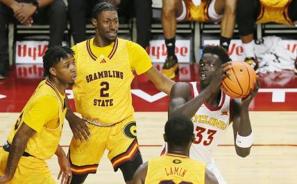 Iowa State Cyclones forward Omaha Biliew (33) looks for a shot around Grambling State defenders during the first half in the NCAA men's basketball at Hilton Coliseum on Sunday, Nov. 19, 2023, in Ames, Iowa.
