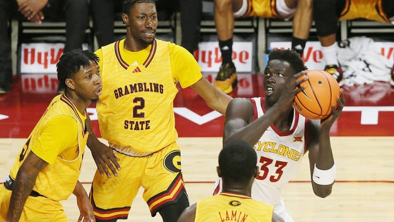 Iowa State Cyclones forward Omaha Biliew (33) looks for a shot around Grambling State defenders during the first half in the NCAA men's basketball at Hilton Coliseum on Sunday, Nov. 19, 2023, in Ames, Iowa.